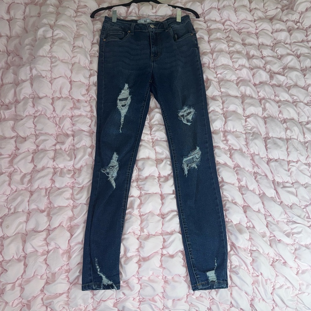 Distressed Blue Jeans